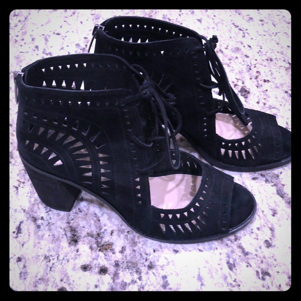 Vince Camuto laceup booties.